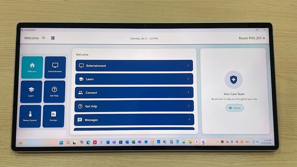 MediBoard welcome screen on an in-room patient tablet, showing entertainment, care team and help options